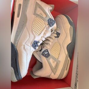 Jordan retro 4’s Kids Shoes in blue and white. Like new condition. With box.